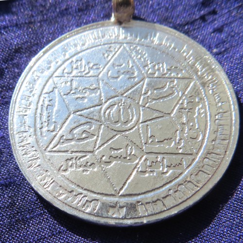 arabic silver jupiter talisman